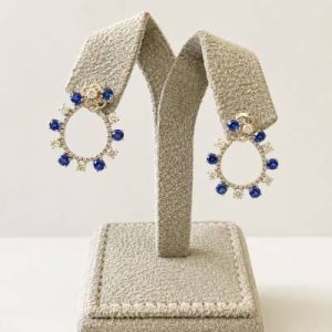 Elegant Tanzanite and Diamond Spiral Earrings in 18K White Gold